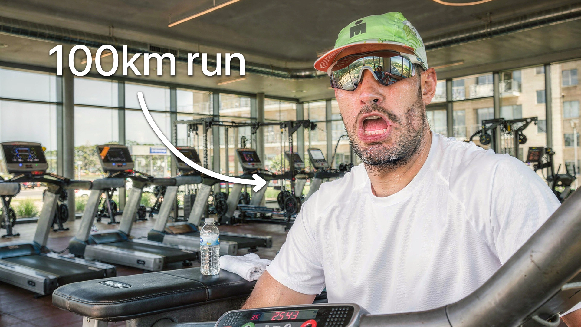 Thumbnail featuring a man in a gym with 100km run text